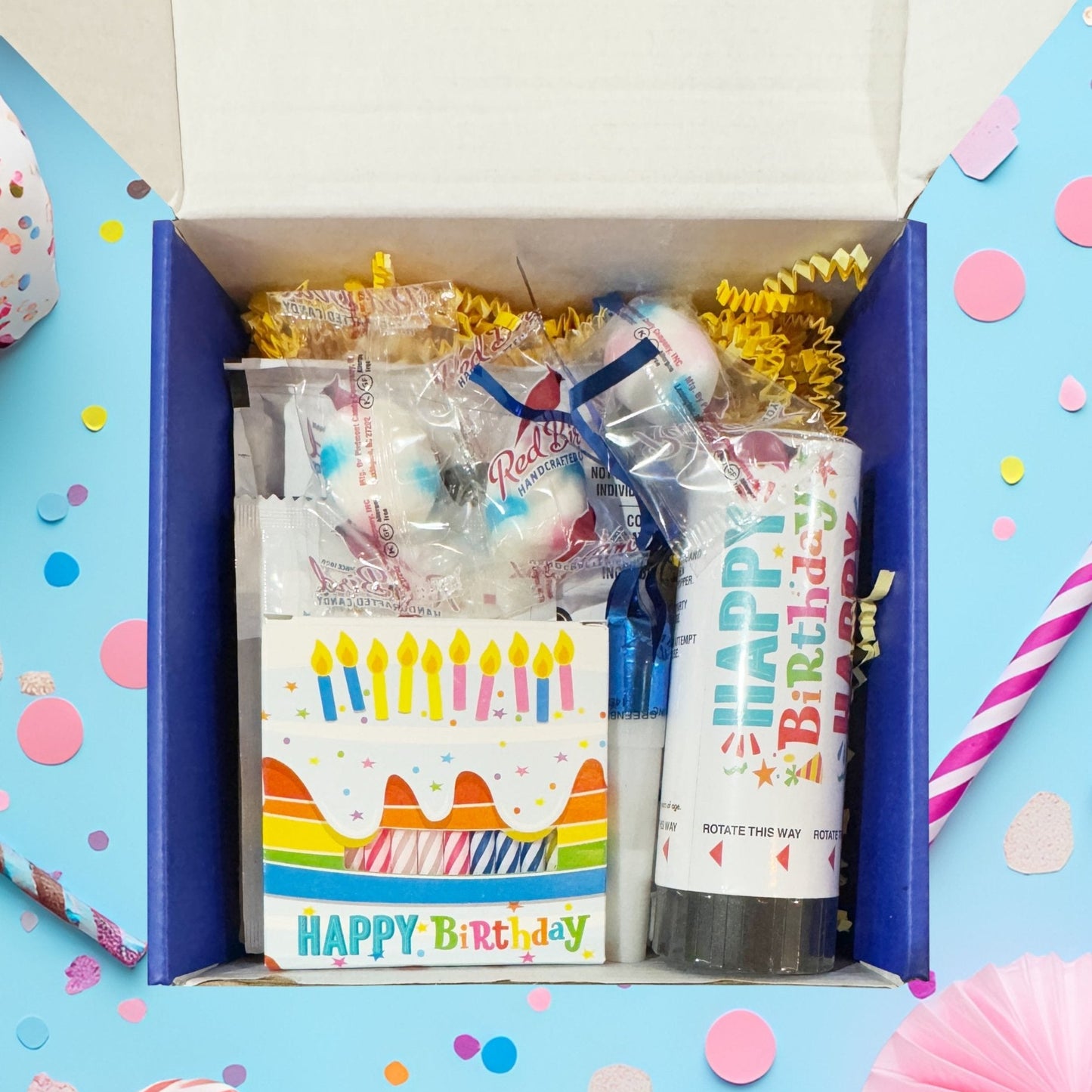 Birthday care package with popping candy and festive party favors
