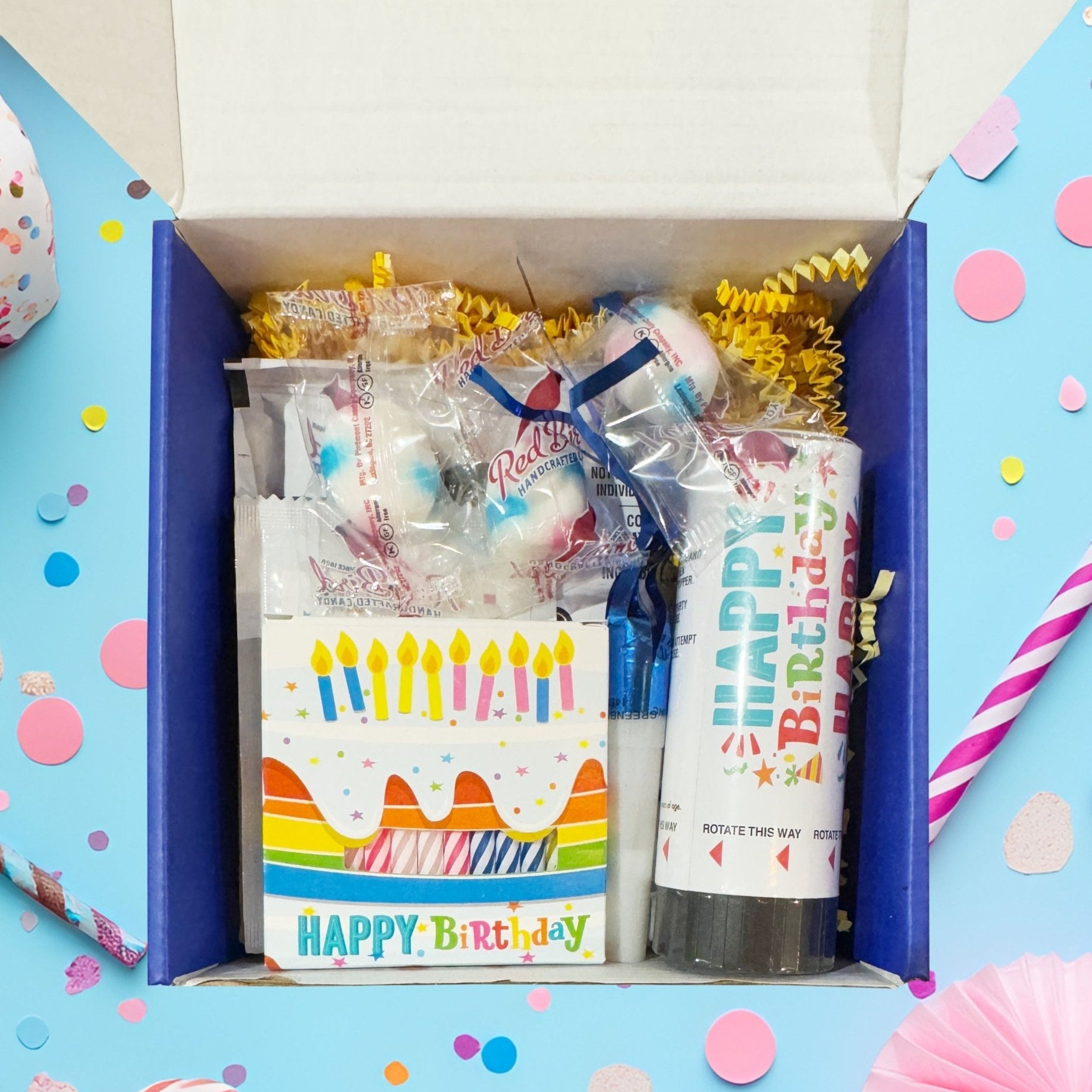 Birthday care package with popping candy and festive party favors