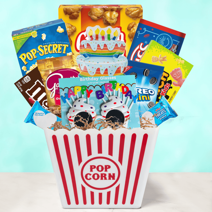 Birthday Movie Night Gift Bucket with popcorn, candy, and balloon