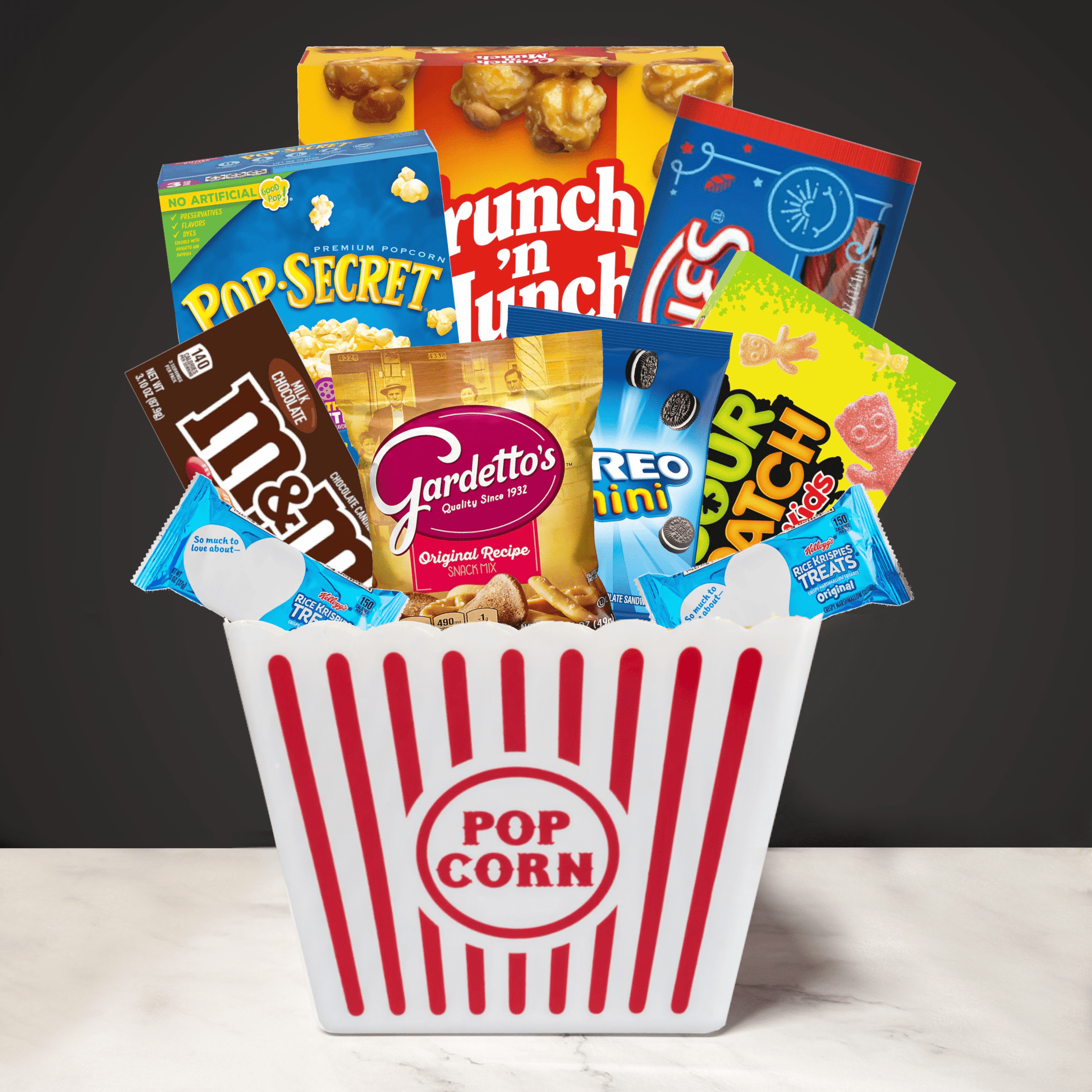 Filled Movie Night Popcorn Bucket with popcorn, candy, and snacks