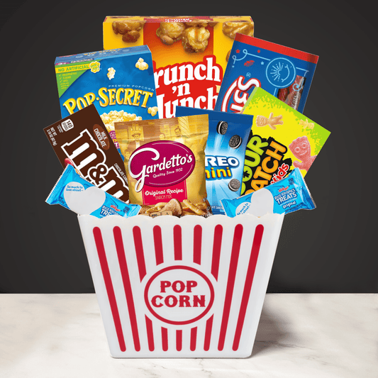 Filled Movie Night Popcorn Bucket with popcorn, candy, and snacks